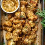 Cheesy Shrimp & Spinach Pasta Rolls with Creamy Red Pepper Sauce using the ingredients you listed. 